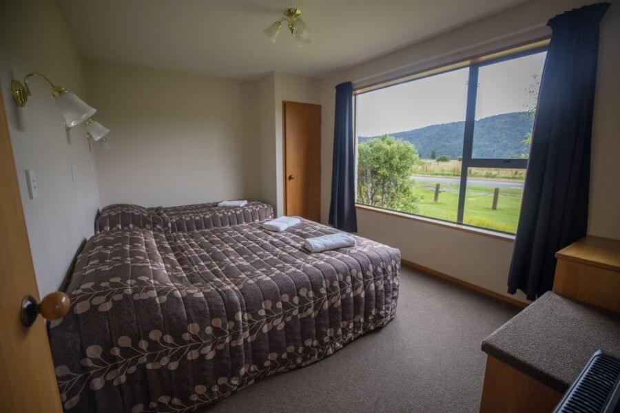 Main bedroom in 1-bedroom unit at Mt Cook View Motel in Fox Glacier